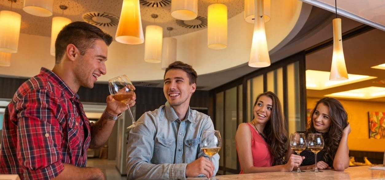 2 Men and 2 Women At A Restaurant