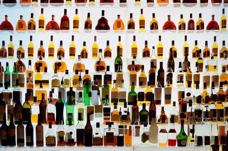 Various alcohol bottles in a bar