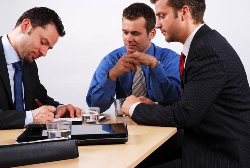 business man signing a contract